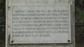 historical cross mark remembering war victims, fort santiago manila philippines.
