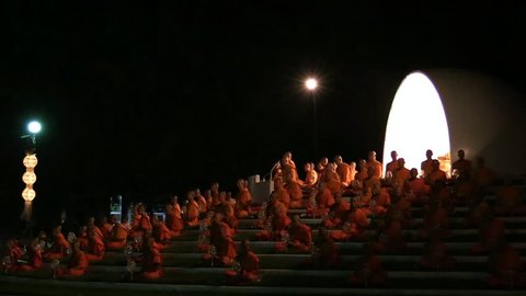 CHIANG MAI - NOVEMBER 2013: Lanna Kathina Monks Meditation, Yee Peng Festival of lights and lanterns at Mae Jo, Chiang Mai, Thailand, 2013. Every tourist and guest can take part at monks meditation.
