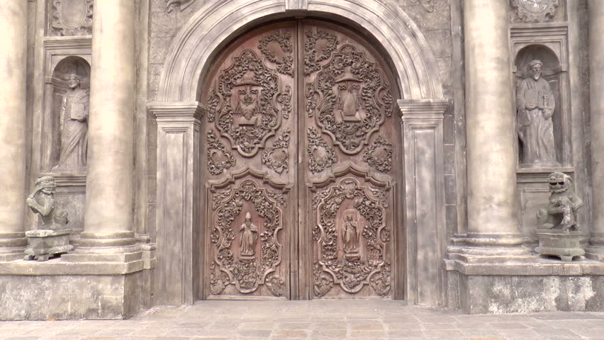 carved doors of san agustin church, intramuros, manila philippines. national historical landmark. designated as world heritage site by unesco.

