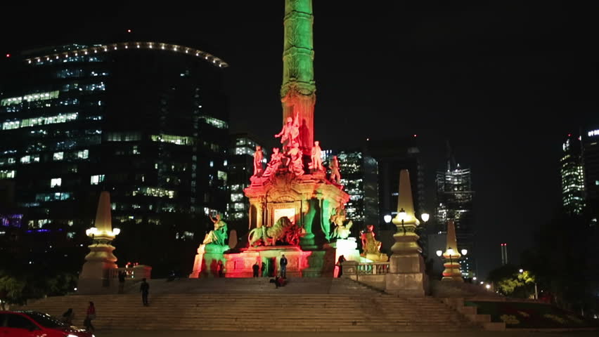 Monument of the independence angel in Mexico city, illuminated by colors