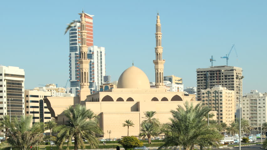 SHARJAH, UAE - DEC 27: Al Etihad - the Main Square in Sharjah City. December 27 2013, Sharjah, United Arab Emirates. 
Zoom Out 1080p time lapse video.