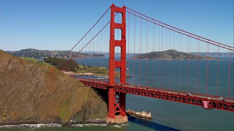 Golden Gate Bridge. Aerial shot of the Golden Gate Bridge in San Francisco on a clear, sunny day. – Video có sẵn