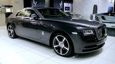BRUSSELS, BELGIUM - JANUARY 14, 2014: Two tone Rolls Royce Wraith coupe on display at the 2014 Brussels motor show. The Wraith is a four-seat coupé based on the chassis of the Rolls-Royce Ghost,