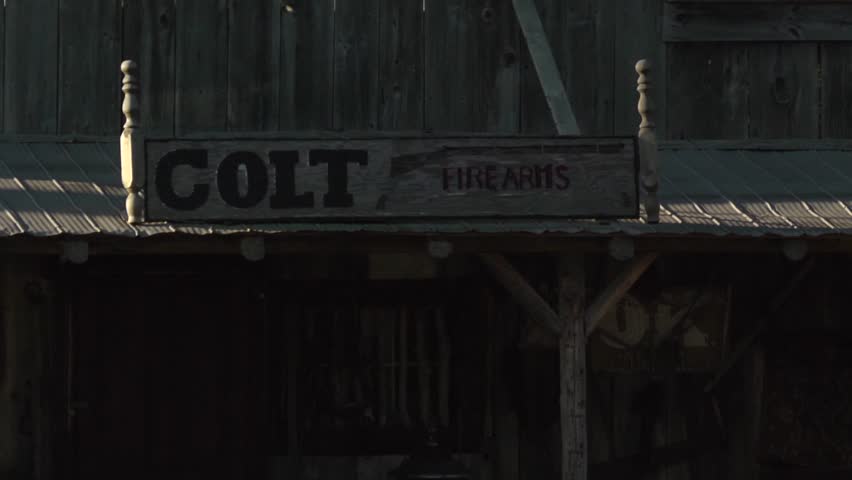 Old West Gun Store Sign and Store