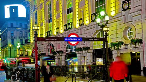 4K Amazing London Piccadilly circus underground sign Quad Ultra HD hyper time lapse. Timelapse movie of the bright lights of Piccadilly Circus in London, at night