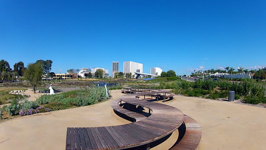 NEWPORT BEACH, CA: December 13, 2013- Shot of unique curved picnic tables at the New Civic Center Park circa 2013 in Newport Beach. Shot of new outdoor furniture at the small public park.