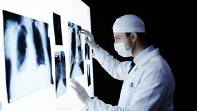Doctor Examining Xray Scans - Powered by Shutterstock - Get 15% off with code: PIKWIZARD15
