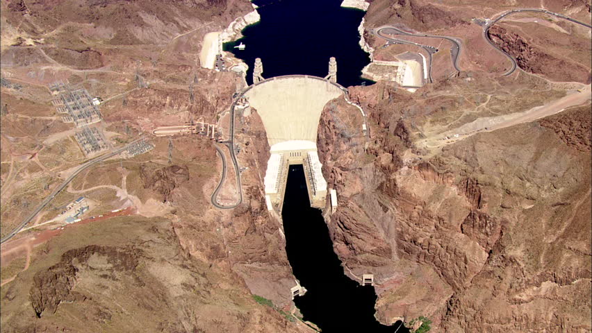 Hoover Dam Water Mountains. Aerial shot of the Hoover Dam. Steep mountains surround one of the largest dams in America.