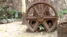 vintage rusty huge cogwheel, gear displayed.
