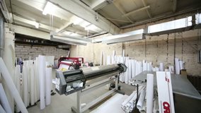 Room in printing house with large printer for large format printing - Powered by Shutterstock - Get 15% off with code: PIKWIZARD15