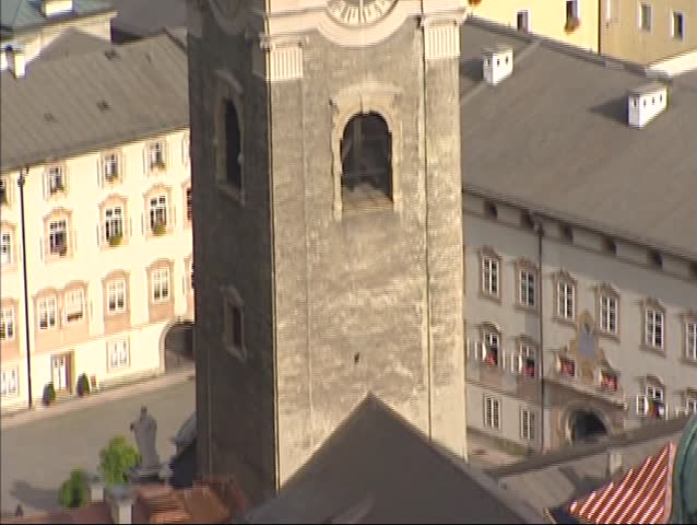 SALZBURG, AUSTRIA -  high angle view at historic city center altstadt - tilt up tower St. Peters Abbey (Stift Sankt Peter)
