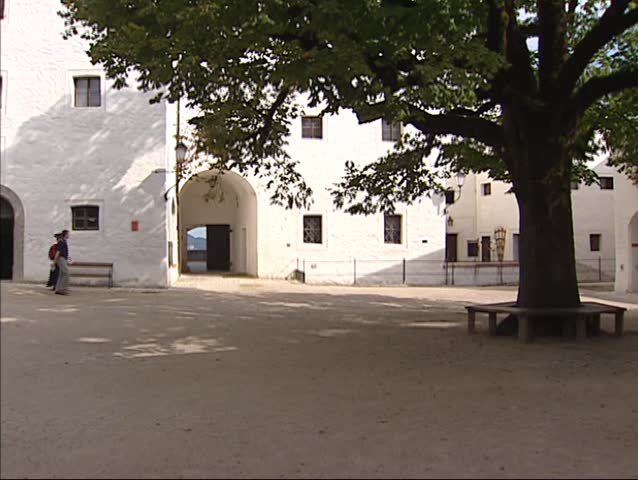 SALZBURG, AUSTRIA - AUGUST 2001: old tree in courtyard fortress Hohensalzburg Castle.