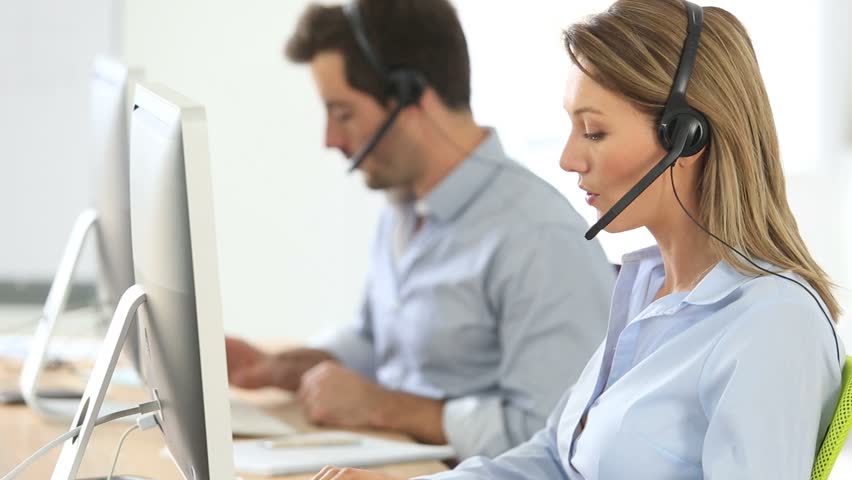 Sales people working in hotline department | Shutterstock HD Video #5489402