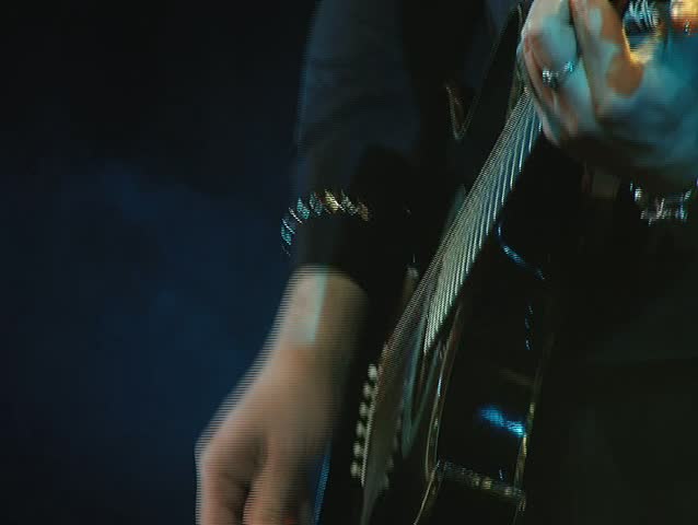 guitarist hands at a rock concert
