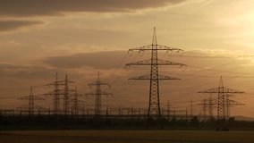 video footage of a landscpape with electrical towers