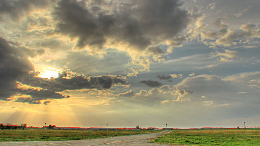 Time lapse of sunset over an airport, HDR imaging (high dynamic range)