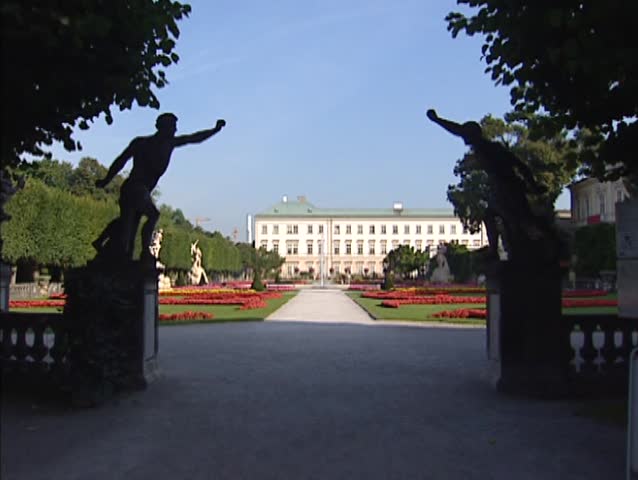 View at Mirabell Palace behind palace gardens. The palace with its gardens is a listed cultural heritage monument and part of the Historic Centre of the City of Salzburg UNESCO World Heritage Site.