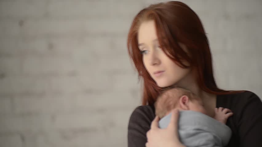 Little baby in mother arms. FullHD, 1080p.