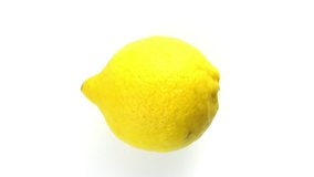 Lemon,  rotating,  upper view, studio shot on white background, HD 1920X1080 - loopable video