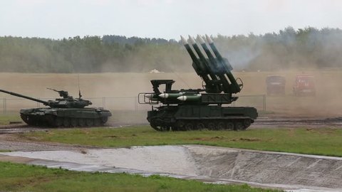 ZHUKOVSKY, RUSSIA - JUNE 25, 2012: Tank T-90A and antiaircraft missile system BUK M2 on the show models of arms and military equipment at the Second International Forum Engineering Technologies