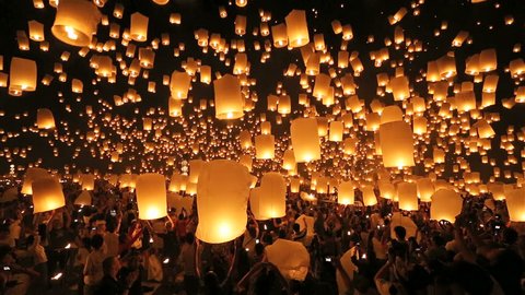 SANSAI, CHIANGMAI, THAILAND - NOV 16: Thousand of sky lanterns release at Loi Krathong celebration during Yee Peng Festival in Chiangmai Mae Jo University, Thailand on November 16, 2013