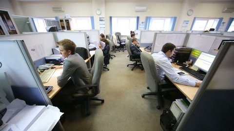 MOSCOW, RUSSIA - AUG 15, 2012: Employees of company RUSELPROM sit at computers in office. RUSELPROM Group comprises 12 companies and affiliated companies.