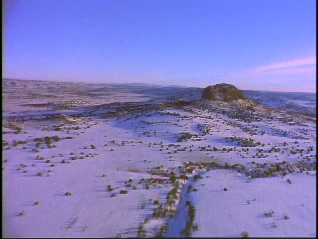 Very old volcano shaft, near Santa Fe, NY in snow. 35 MM film aerials of US Southwest, four corners, Monument Valley, Lake Powell, Moab area.