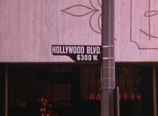 A shot of Hollywood Boulevard, Los Angeles in the 1960s. Authentic. Specific year unknown.