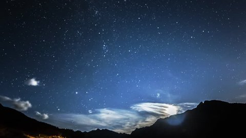 timelapse stars and moon in mountain night sky. Moonrise