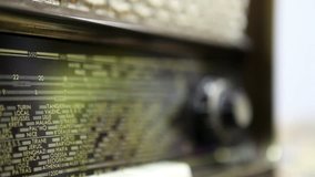 Very old Retro Radio, Hand Changing stations, Using shallow depth of Field - Full HD 1920X1080