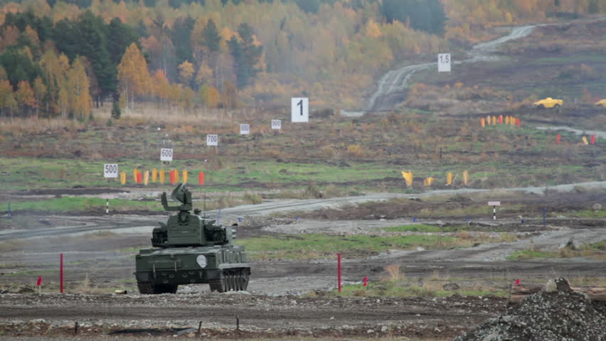 Tracked self-propelled anti-aircraft weapon fires at the landfill