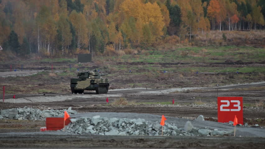 Self-propelled amphibious gun mount with antitank gun fires at the landfill