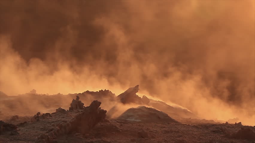 Martian terrain, acid fumes in backlight, volcanic rocks. Geothermal area, Iceland. Slow motion: shot at 60fps, conformed to 25fps, it can be interpreted at any fps from 24 to 60fps. Codec: ProRes Royalty-Free Stock Footage #5577695