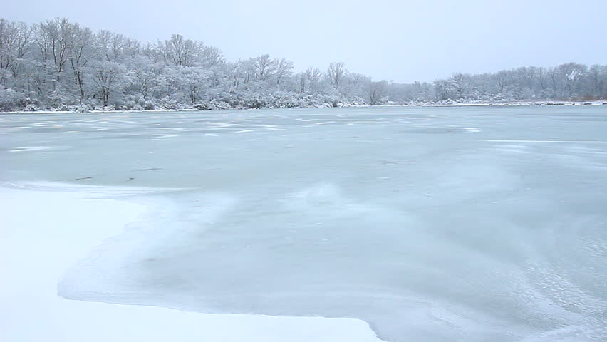 Freshly fallen snow on Pierce Lake at Rock Cut State Park, Illinois
