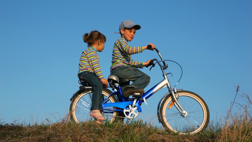 girl and boy cycle