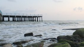 panning video of Sea with jetty on evening