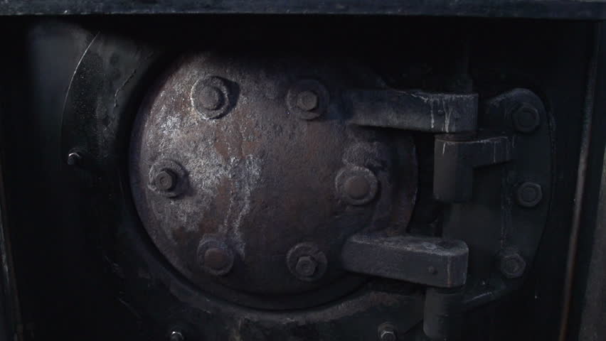 stove oven. steam oven. old stove. steel door. fire. hot heat stoke. char charcoal. coal fireplace. nostalgic. romantic. opening door. 1920x1080  Royalty-Free Stock Footage #5595032