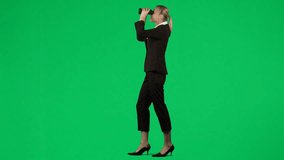 Businesswoman looking throught a binocular - Powered by Shutterstock - Get 15% off with code: PIKWIZARD15