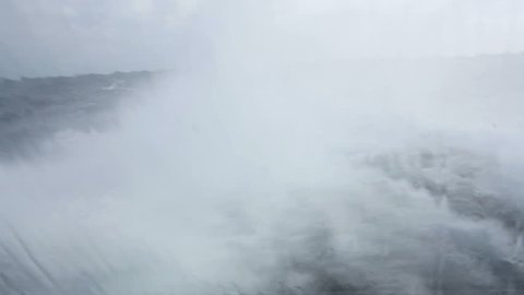 view on swell from a boat during stormy weather 