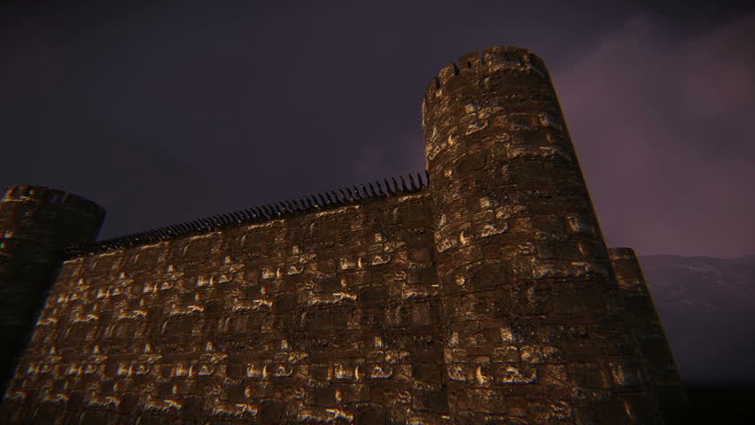 Mythological dragon breathing fire on the tower of a medieval castle