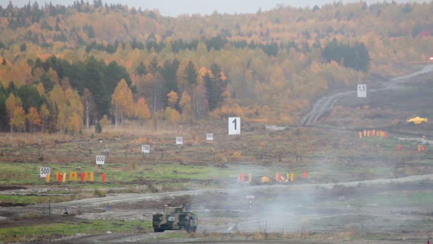 Military exercises at the landfill, fighting machine of infantry fire from a gun