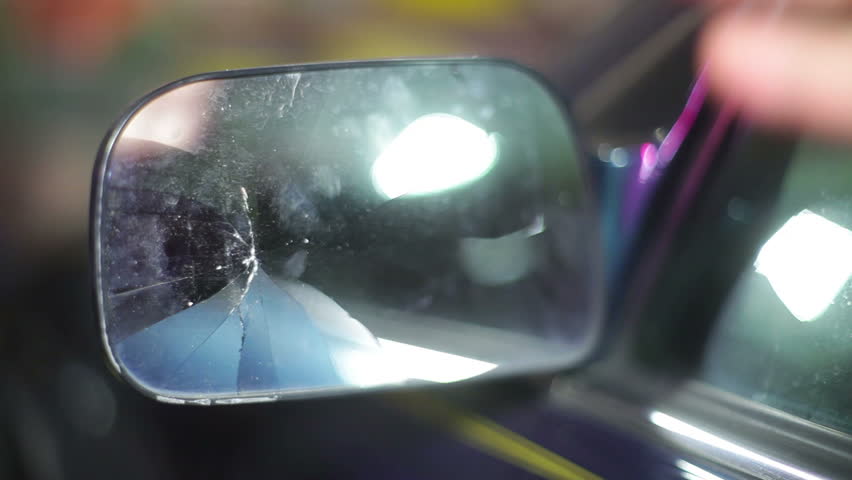 A broken rear view mirror | Shutterstock HD Video #5614289
