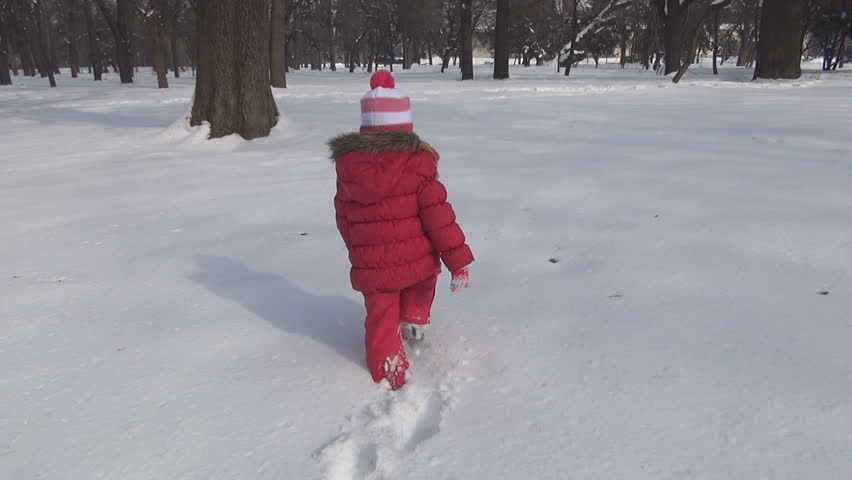 girl walking in snow
