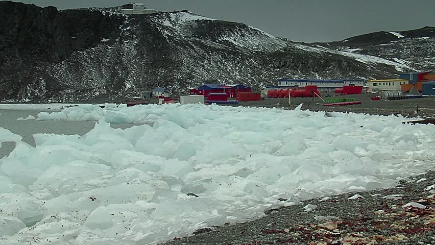 Frei station villa las estrellas with lots of ice accumulated on the beach in Antarctica