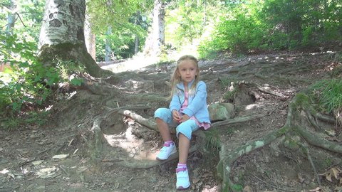 Sad, Thinking Little Girl in Wood, Bored, Thoughtful Child in Forest, Children