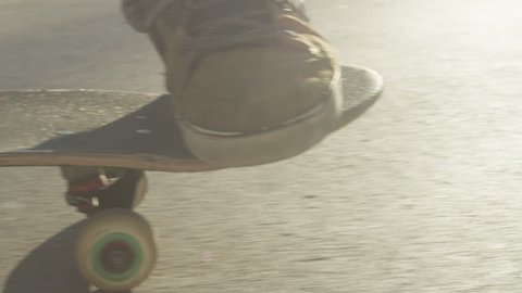 SLOW MOTION: Close-up skateboarding