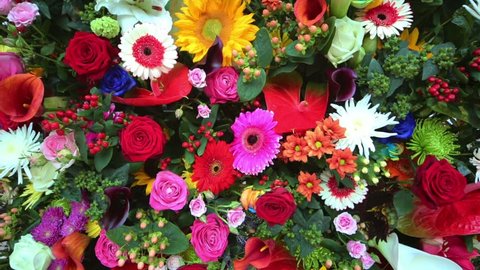 Beautiful bright flowers in bouquet of callas, lilies, roses, gerberas.