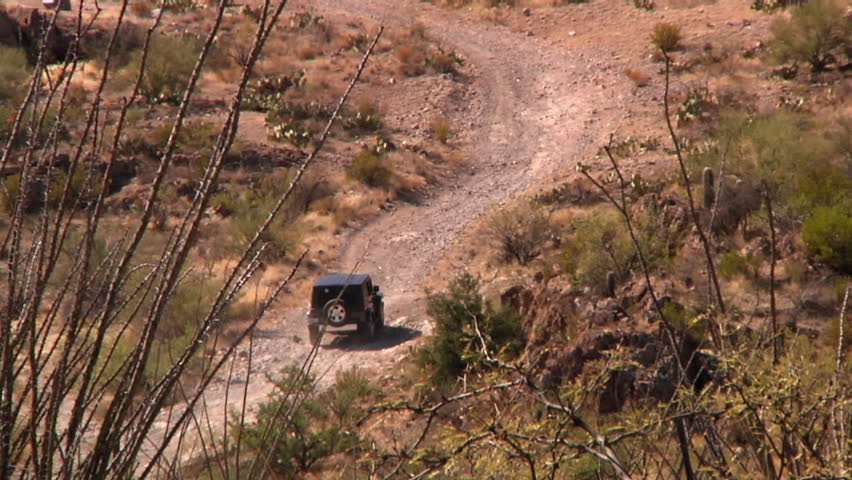 Driving off-road in the Arizona desert.