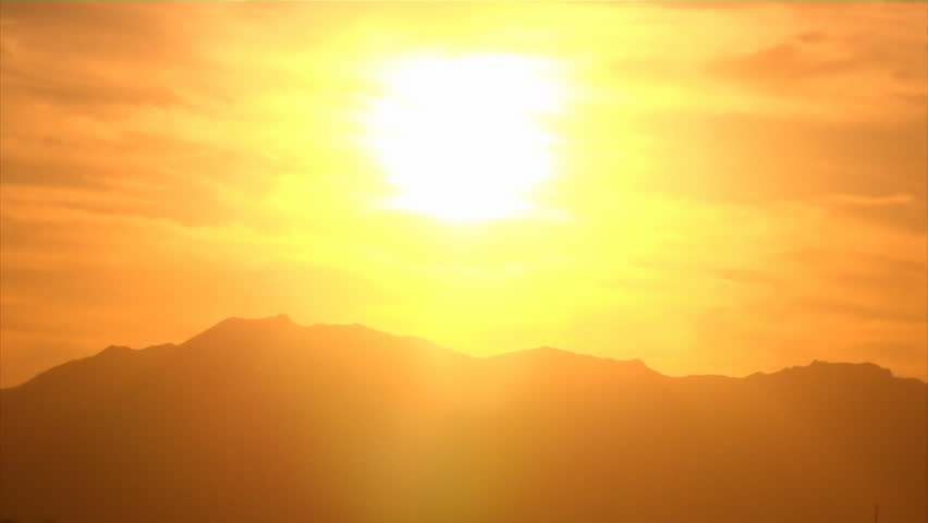 Sunset time lapse over an Arizona mountain.