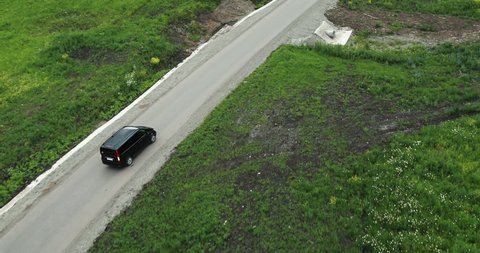 Aerial View. Car on a winding road in the hills. Altai Mountains, Siberia, Russia. Summer 2013